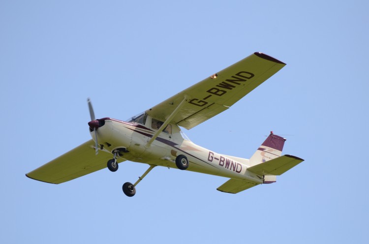 Two-seat plane in flight