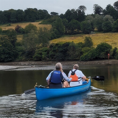 River Dart Canoe Tour - Pair Canoeing River