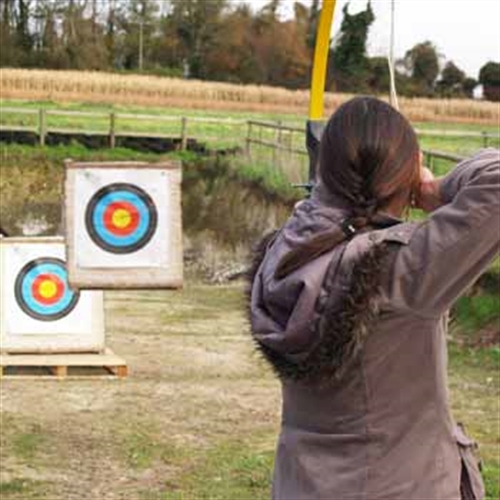 woman shooting at targets woman shooting at targets