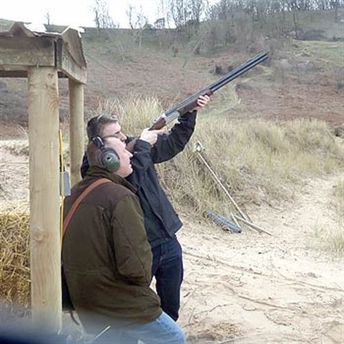 Man clay pigeon shooting gower Man clay pigeon shooting gower