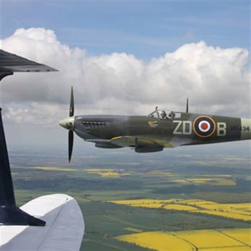Wing to wing Spitfire flights from Duxford in a Dragon Rapide Wing to wing Spitfire flights from Duxford in a Dragon Rapide