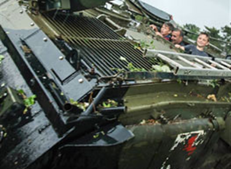 kids driving tanks kids driving tanks